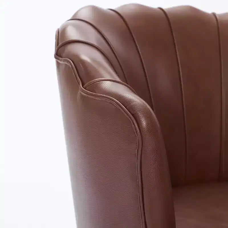 Fauteuil pivotant Pétale, Fauteuil d'appoint avec base métallique rotative, Dossier incurvé cannelé, Fauteuil de bureau à oreilles en cuir véritable pour bureau, salon