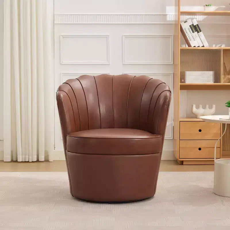 Fauteuil pivotant Pétale, Fauteuil d'appoint avec base métallique rotative, Dossier incurvé cannelé, Fauteuil de bureau à oreilles en cuir véritable pour bureau, salon