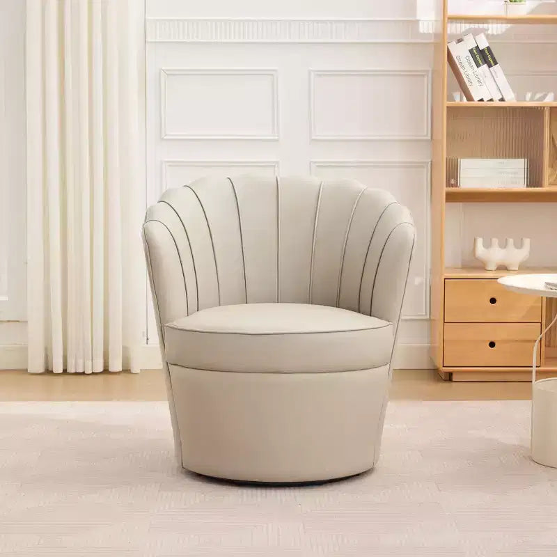 Fauteuil pivotant Pétale, Fauteuil d'appoint avec base métallique rotative, Dossier incurvé cannelé, Fauteuil de bureau à oreilles en cuir véritable pour bureau, salon
